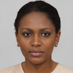 Neutral black young-adult female with short  brown hair and brown eyes