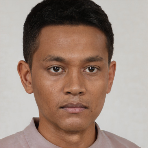 Neutral black young-adult male with short  brown hair and brown eyes