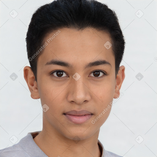 Joyful latino young-adult male with short  brown hair and brown eyes