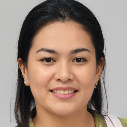 Joyful white young-adult female with medium  brown hair and brown eyes