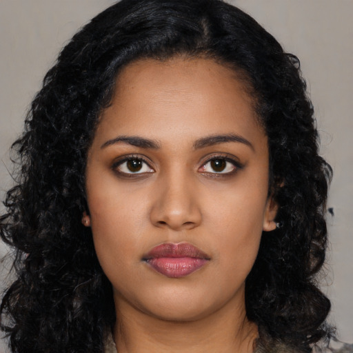Neutral latino young-adult female with long  black hair and brown eyes
