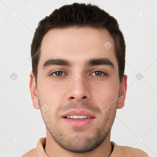 Neutral white young-adult male with short  brown hair and brown eyes