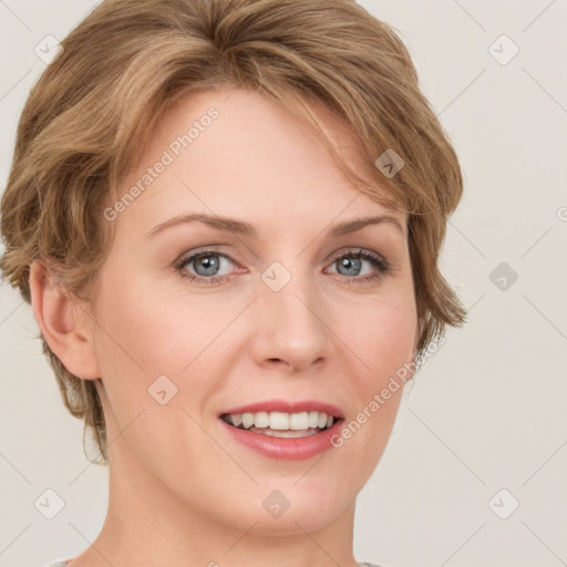 Joyful white young-adult female with medium  brown hair and blue eyes