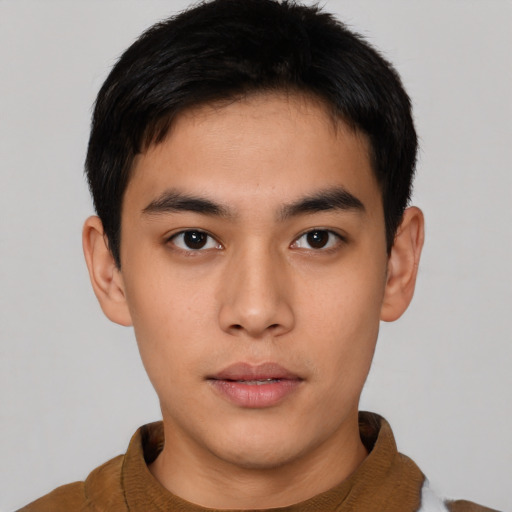 Neutral asian young-adult male with short  brown hair and brown eyes