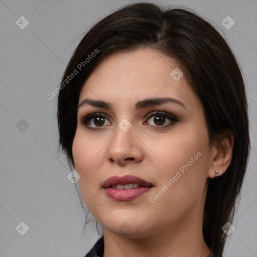 Joyful white young-adult female with medium  brown hair and brown eyes