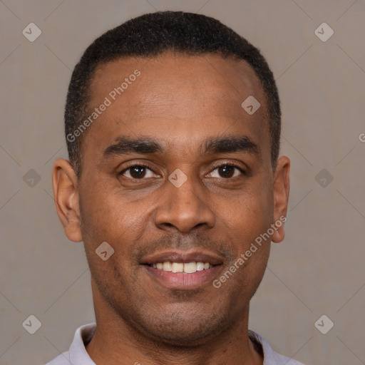 Joyful latino young-adult male with short  brown hair and brown eyes