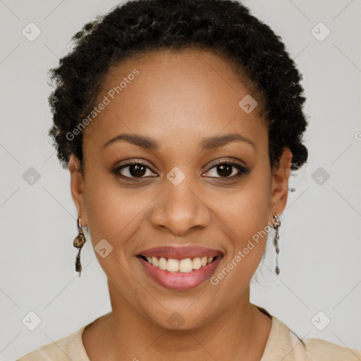 Joyful black young-adult female with short  brown hair and brown eyes