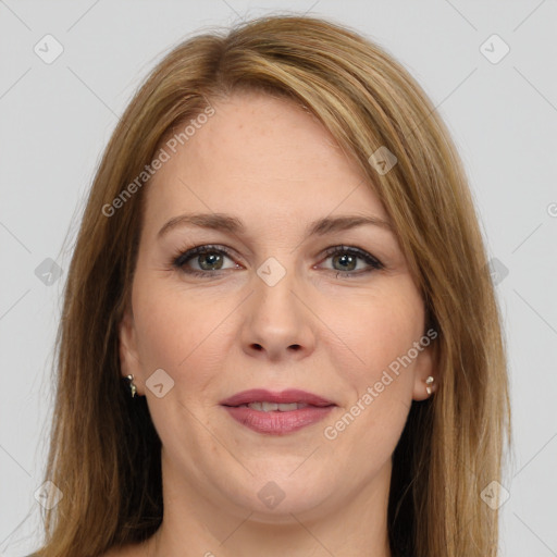 Joyful white adult female with long  brown hair and brown eyes