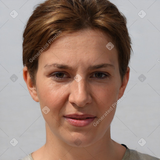 Joyful white adult female with short  brown hair and grey eyes