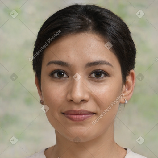 Joyful latino young-adult female with short  brown hair and brown eyes