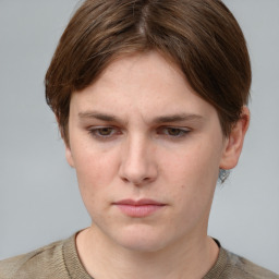 Neutral white young-adult female with short  brown hair and grey eyes