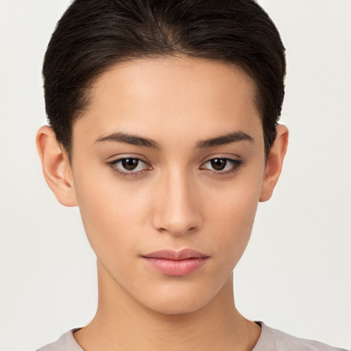 Neutral white young-adult female with short  brown hair and brown eyes