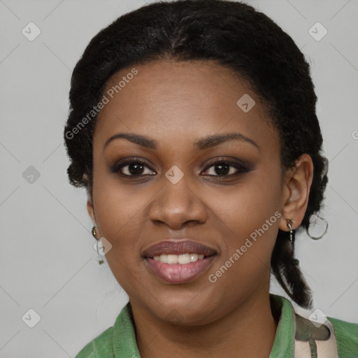 Joyful black young-adult female with medium  black hair and brown eyes