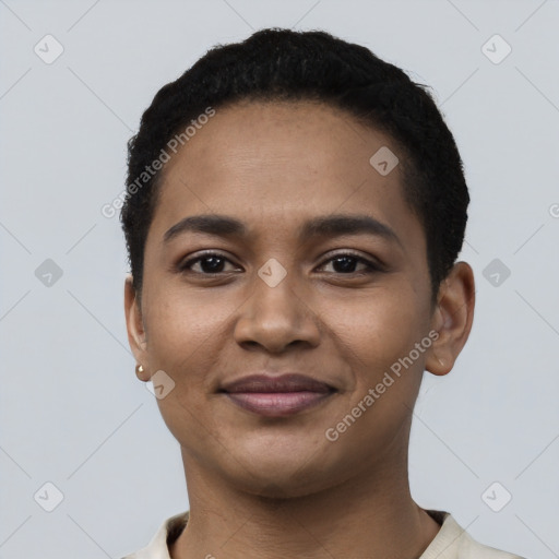 Joyful latino young-adult female with short  black hair and brown eyes