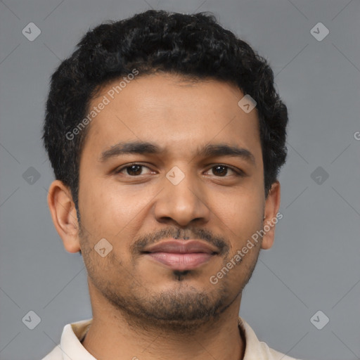 Joyful latino young-adult male with short  brown hair and brown eyes