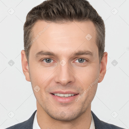 Joyful white young-adult male with short  brown hair and brown eyes