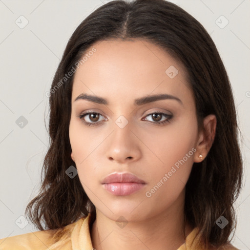 Neutral white young-adult female with long  brown hair and brown eyes