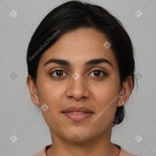 Joyful latino young-adult female with short  brown hair and brown eyes