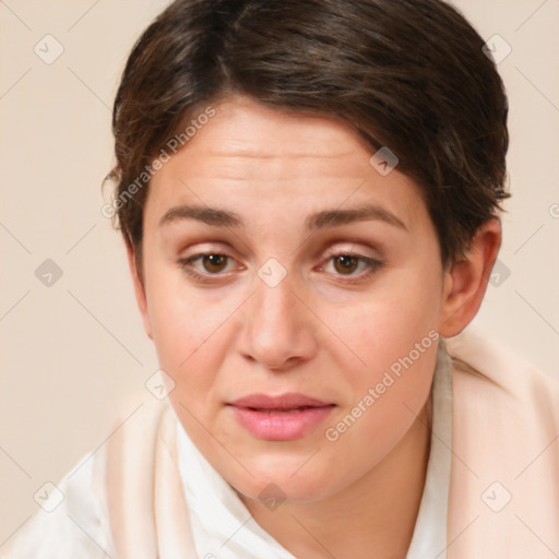 Joyful white young-adult female with short  brown hair and brown eyes