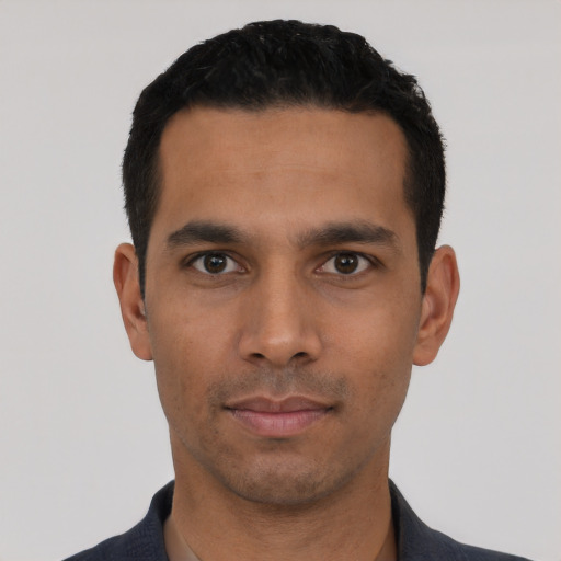 Neutral latino young-adult male with short  black hair and brown eyes