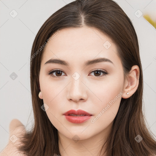 Neutral white young-adult female with long  brown hair and brown eyes