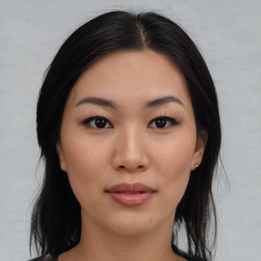 Neutral asian young-adult female with medium  black hair and brown eyes