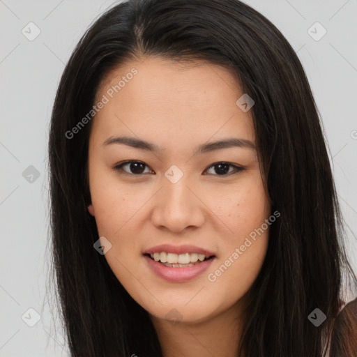 Joyful asian young-adult female with long  brown hair and brown eyes