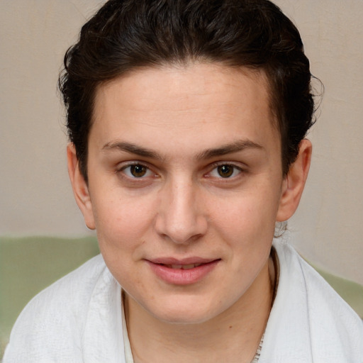 Joyful white young-adult female with short  brown hair and brown eyes