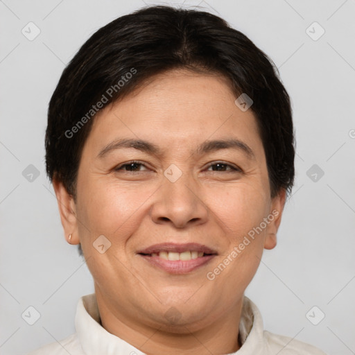 Joyful white adult female with short  brown hair and brown eyes