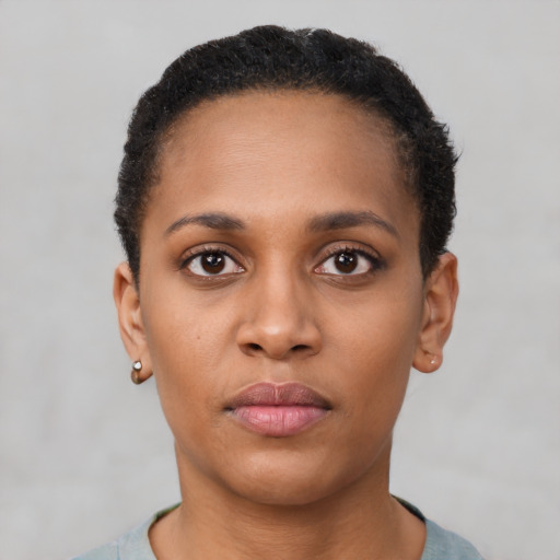 Neutral latino young-adult female with short  brown hair and brown eyes