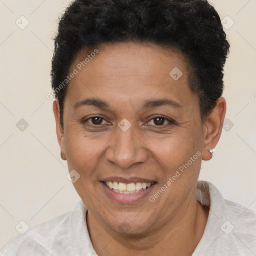 Joyful latino adult female with short  brown hair and brown eyes