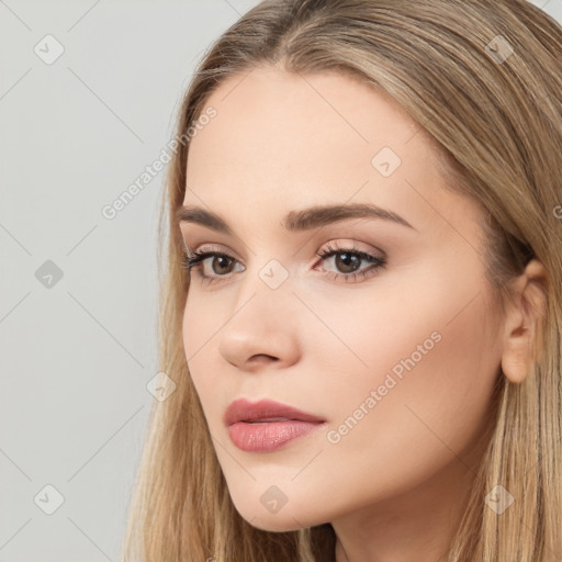 Neutral white young-adult female with long  brown hair and brown eyes