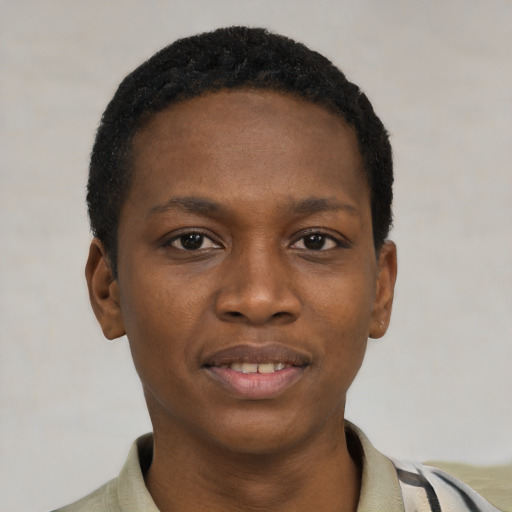 Joyful black young-adult female with short  black hair and brown eyes