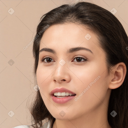 Joyful white young-adult female with long  brown hair and brown eyes