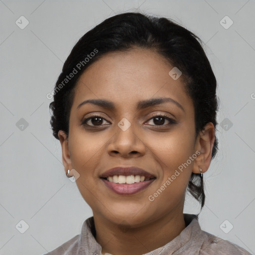 Joyful latino young-adult female with short  black hair and brown eyes