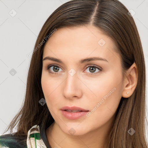 Neutral white young-adult female with long  brown hair and brown eyes