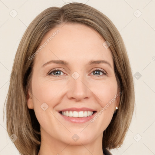 Joyful white young-adult female with medium  brown hair and green eyes