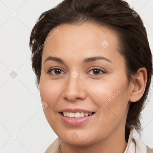 Joyful white young-adult female with medium  brown hair and brown eyes