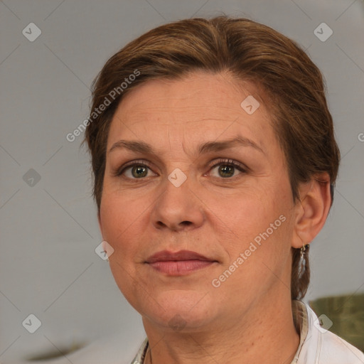 Joyful white adult female with short  brown hair and brown eyes