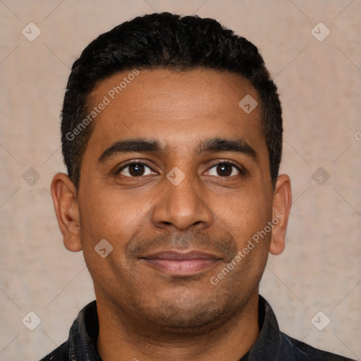 Joyful latino young-adult male with short  black hair and brown eyes