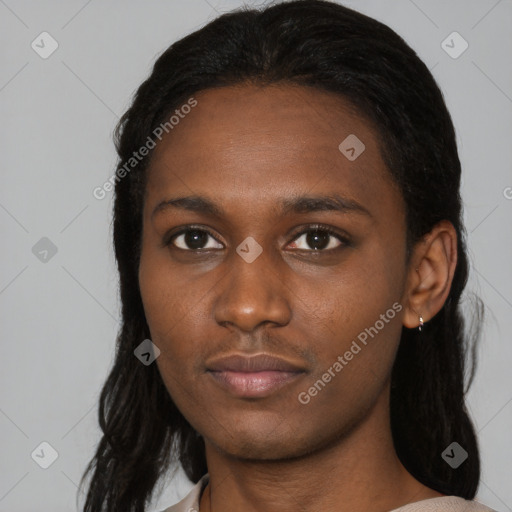 Neutral black young-adult female with medium  black hair and brown eyes