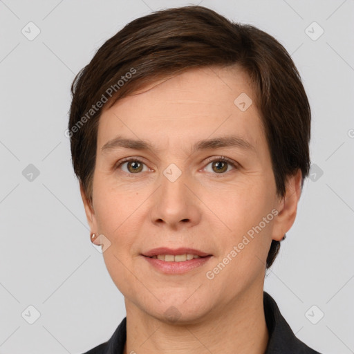 Joyful white adult female with short  brown hair and brown eyes