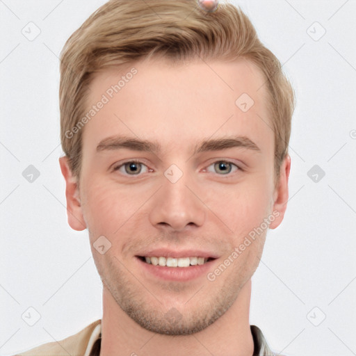 Joyful white young-adult male with short  brown hair and grey eyes