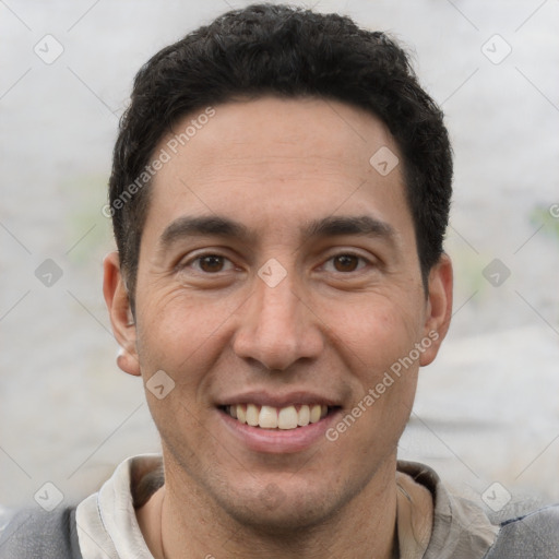 Joyful white adult male with short  black hair and brown eyes