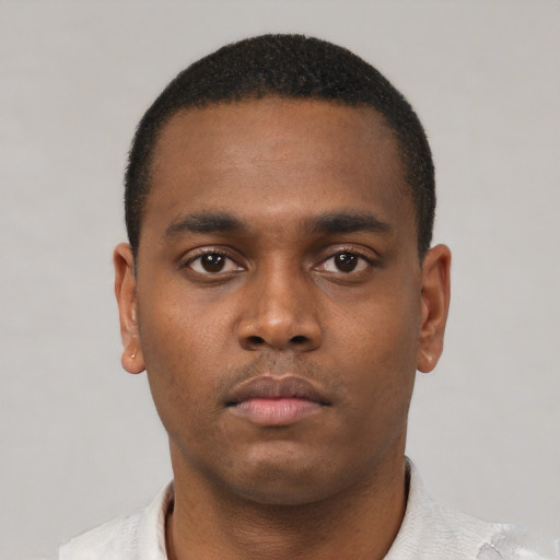 Neutral black young-adult male with short  black hair and brown eyes