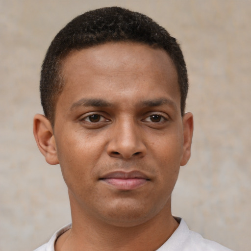 Neutral black young-adult male with short  brown hair and brown eyes