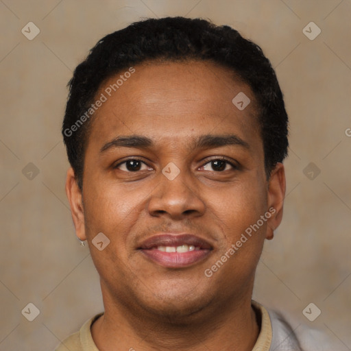 Joyful latino young-adult male with short  brown hair and brown eyes
