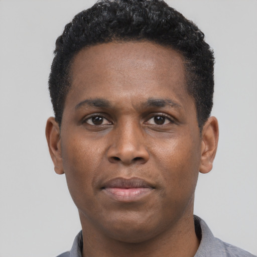 Neutral black young-adult male with short  black hair and brown eyes