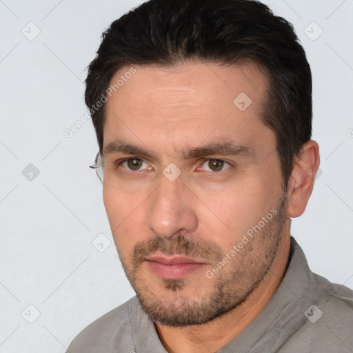 Neutral white adult male with short  brown hair and brown eyes