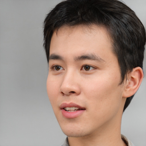 Neutral asian young-adult male with short  black hair and brown eyes